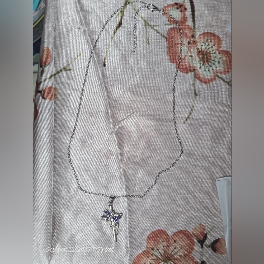 Elegant Silver Necklace with Blue hummingbirds, roses on a cross nip